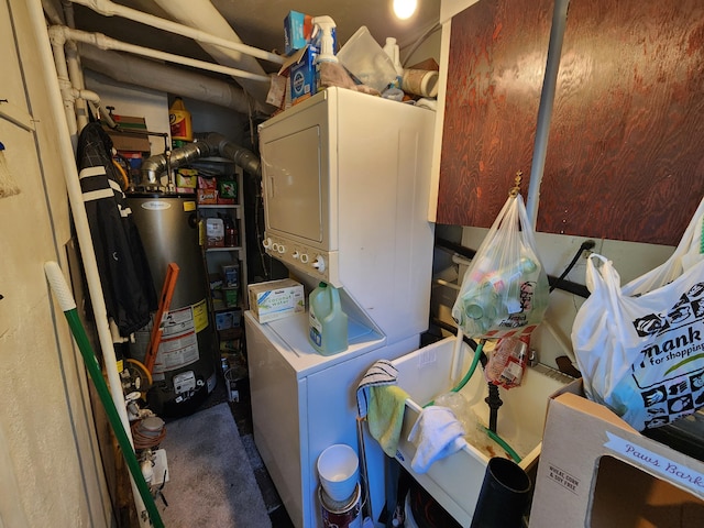 23006 Rosalind Ave, Eastpointe, MI 48021 - washroom featuring stacked washer / dryer and gas water heater