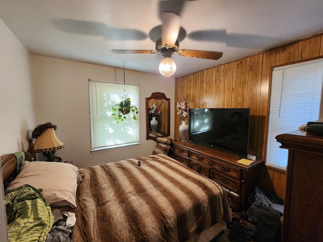 23006 Rosalind Ave, Eastpointe, MI 48021 - bedroom featuring wood walls and a ceiling fan