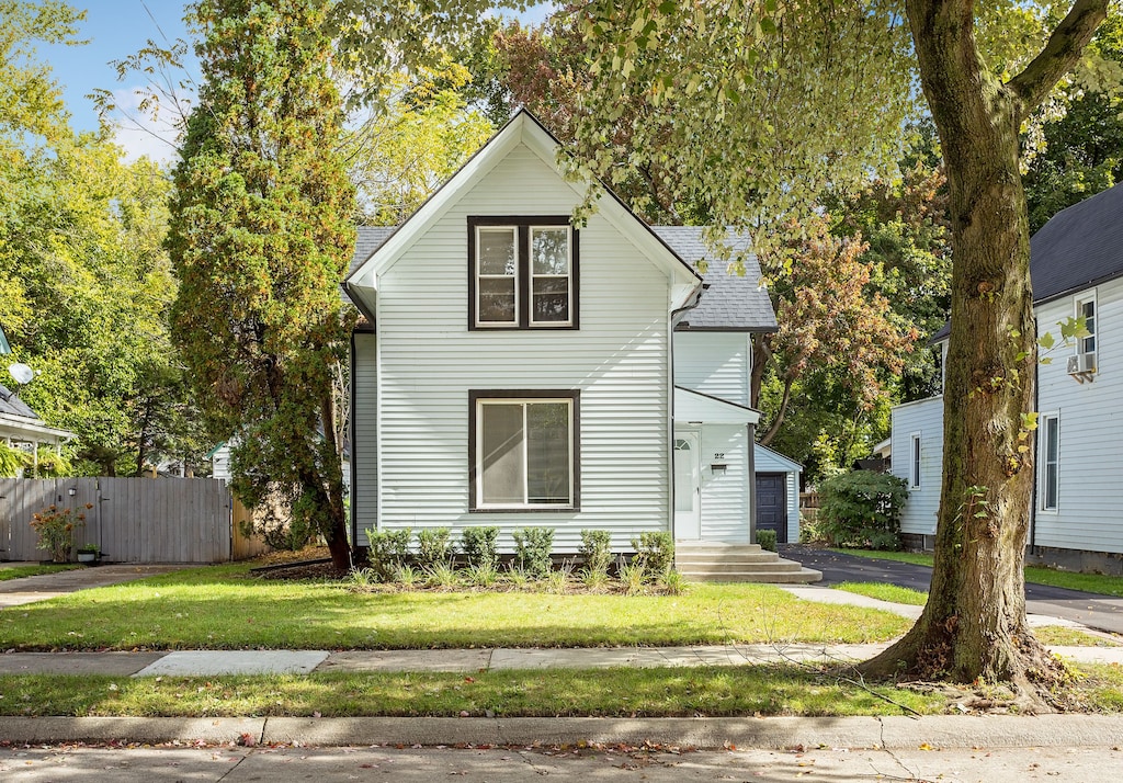 view of front property with a front lawn