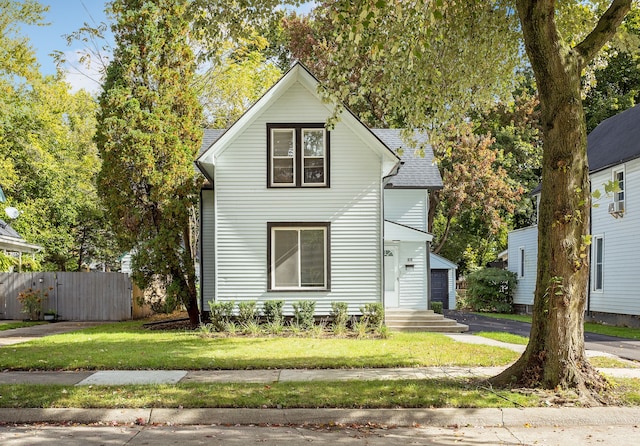 view of front property with a front lawn