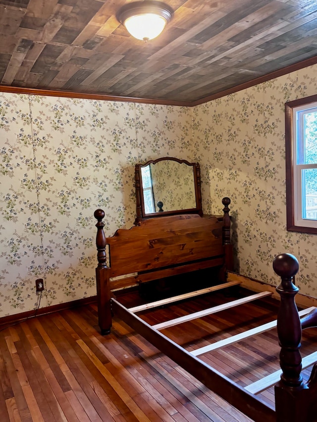 bedroom featuring wood ceiling, crown molding, wood-type flooring, and vaulted ceiling