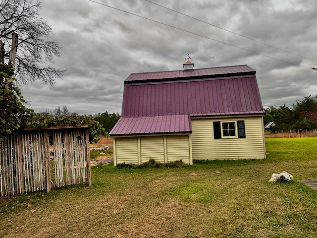 view of home's exterior featuring a lawn