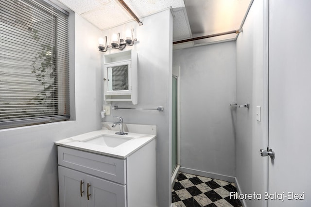 bathroom featuring vanity and walk in shower