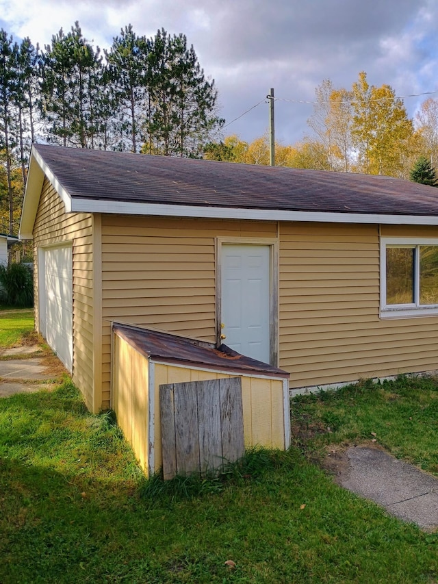 view of outbuilding with a garage