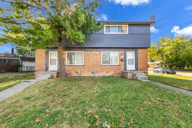 view of front of home with a front yard