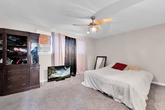 carpeted bedroom with ceiling fan and cooling unit