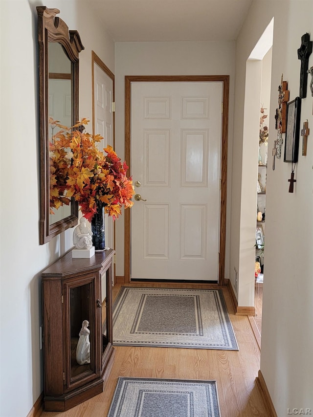 doorway featuring light hardwood / wood-style flooring