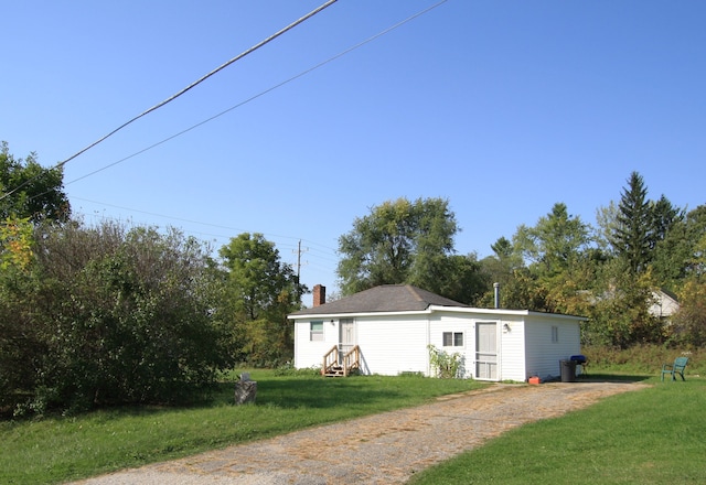 exterior space with a lawn