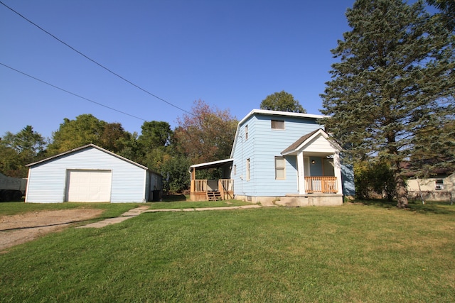 view of outbuilding featuring a lawn and a garage