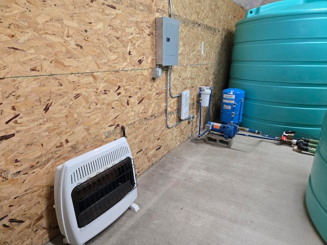 interior details featuring electric panel and heating unit