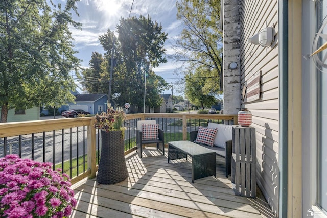 wooden deck with an outdoor hangout area