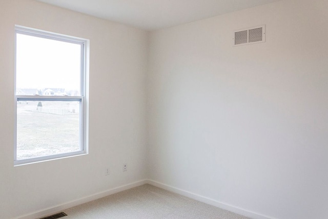 unfurnished room with carpet