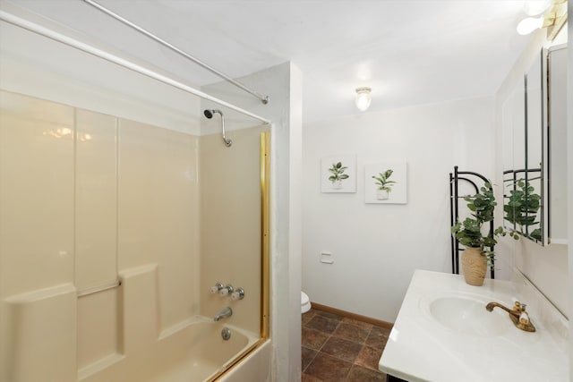 full bathroom featuring tile patterned flooring, toilet, vanity, and washtub / shower combination