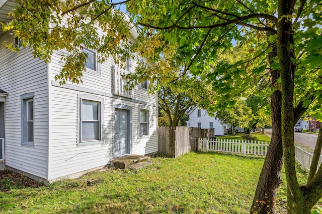 exterior space with a yard