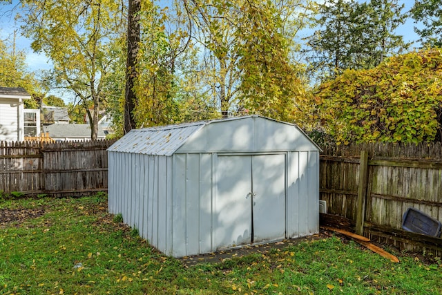 view of outdoor structure featuring a yard