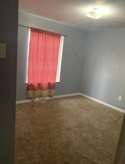 empty room featuring carpet