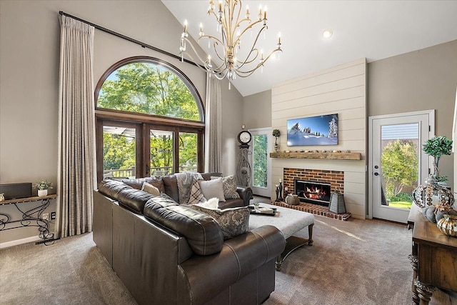 living room featuring carpet, a healthy amount of sunlight, and high vaulted ceiling