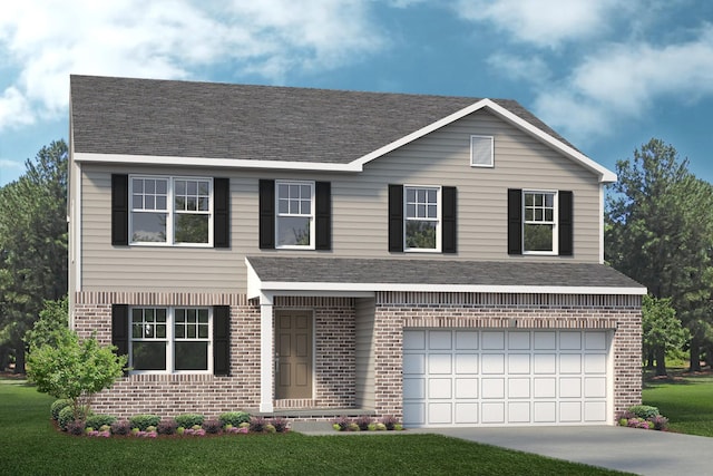 view of front of home with a front yard and a garage