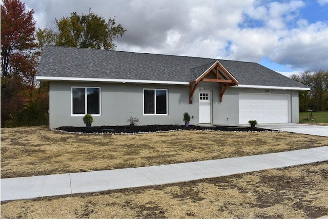 single story home featuring a garage