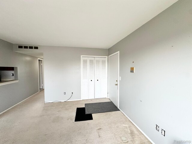 51316 Johns Dr Unit 14, Chesterfield, MI 48047 - unfurnished bedroom with carpet flooring and baseboards