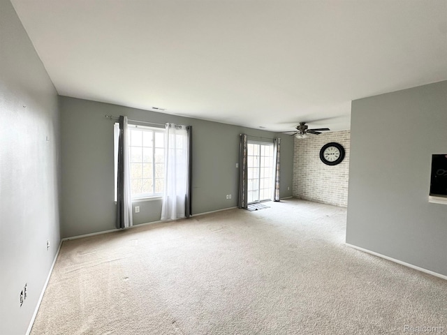 51316 Johns Dr Unit 14, Chesterfield, MI 48047 - spare room with a ceiling fan, carpet floors, and baseboards