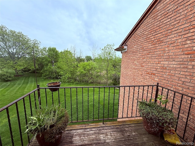 51316 Johns Dr Unit 14, Chesterfield, MI 48047 - wooden deck with a lawn and an outdoor fire pit