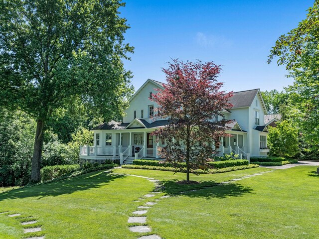 view of front of property with a front lawn