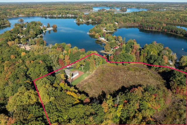 birds eye view of property featuring a water view