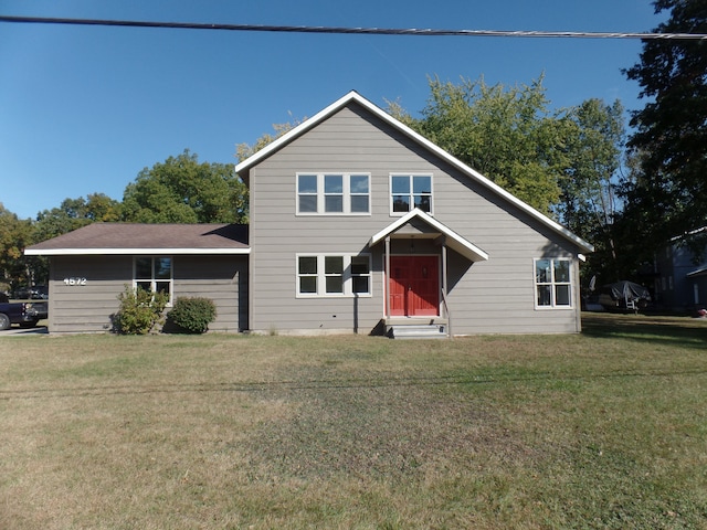 view of front of home with a front yard