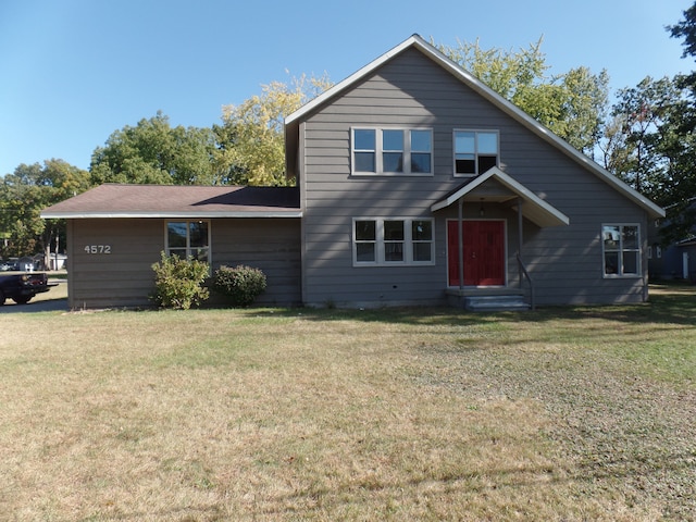 view of front property with a front lawn