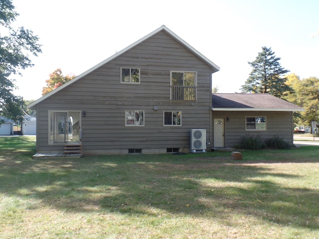 back of house with a yard