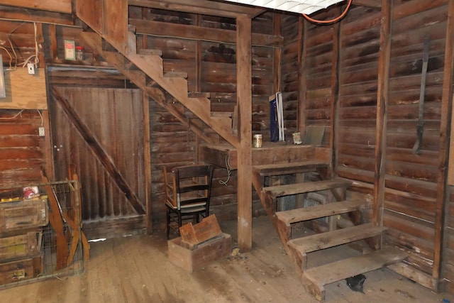 basement featuring wood-type flooring