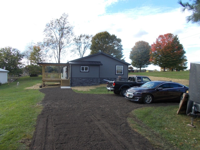 view of home's exterior featuring a yard