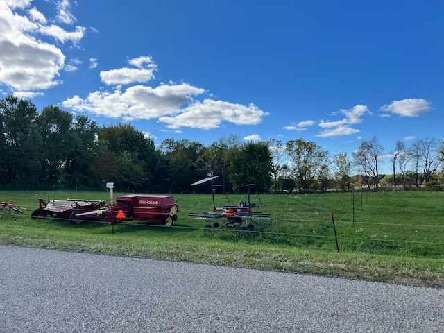 view of property's community featuring a yard