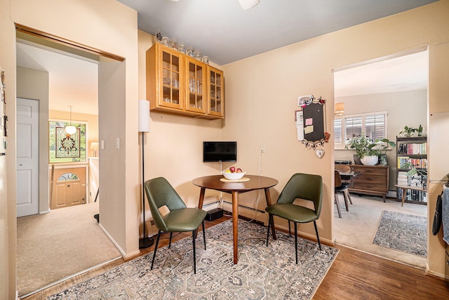 dining room with hardwood / wood-style flooring