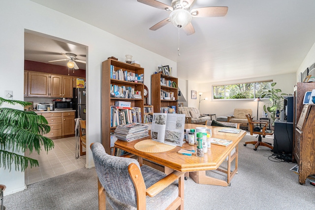 view of carpeted dining space