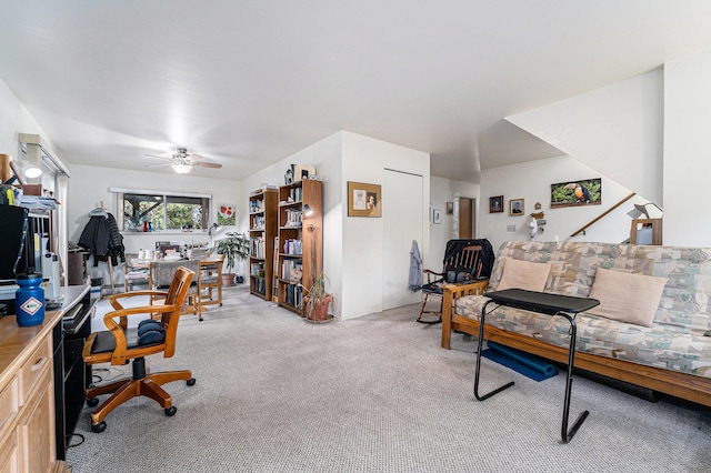 office with ceiling fan and light carpet