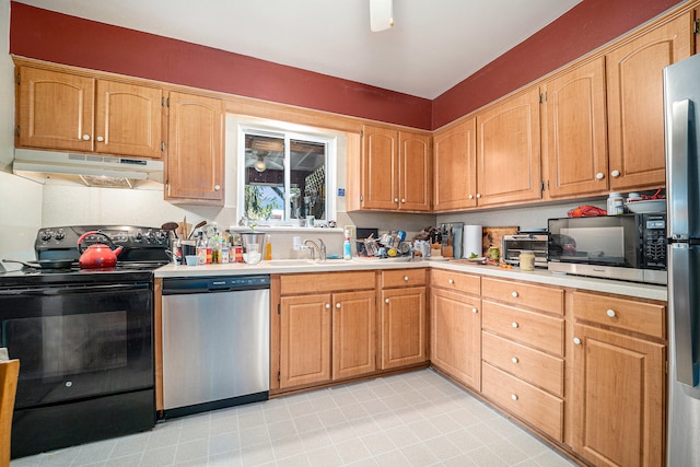 kitchen with sink and appliances with stainless steel finishes