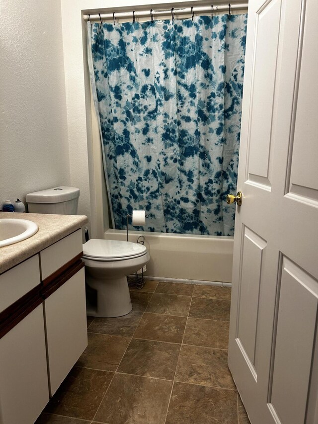 3714 W Hastings Lake Rd, Jonesville, MI 49250 - full bath featuring vanity, toilet, and shower / bath combo with shower curtain