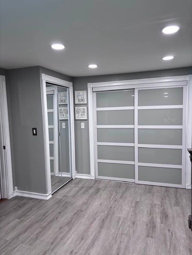 interior space with light hardwood / wood-style flooring