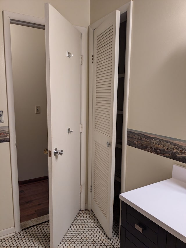 bathroom with tile patterned flooring