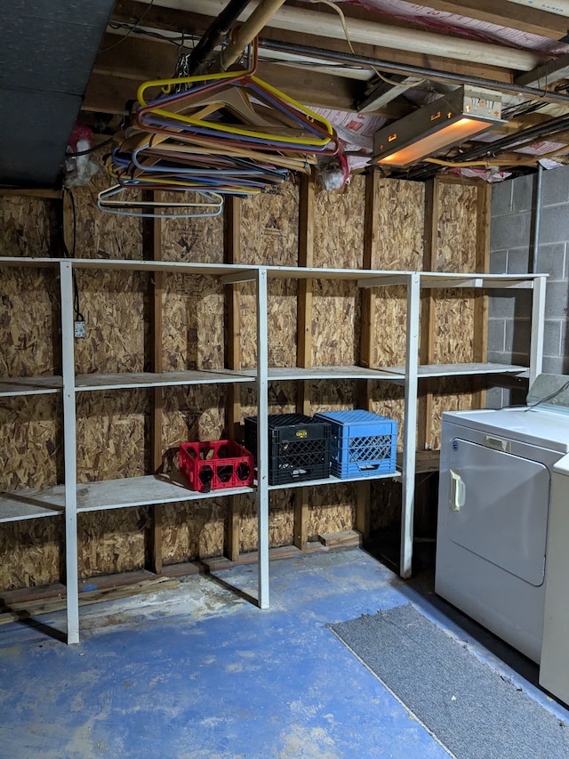 storage room with separate washer and dryer