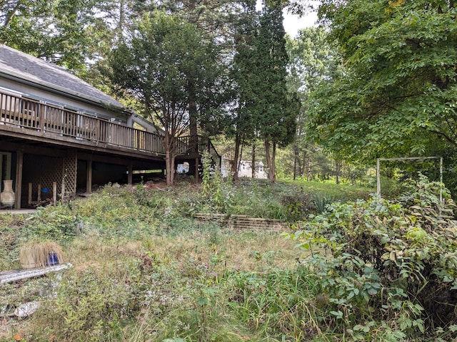 view of yard with a deck