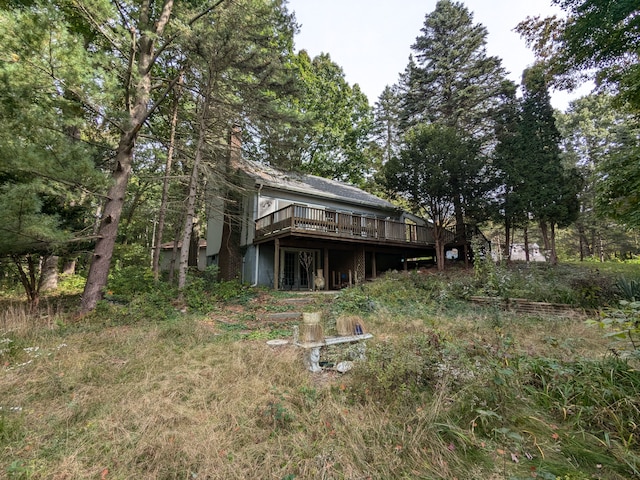 rear view of house with a deck