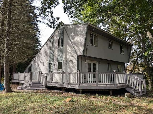 back of property featuring french doors and a deck