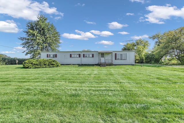 view of front of home with a front yard