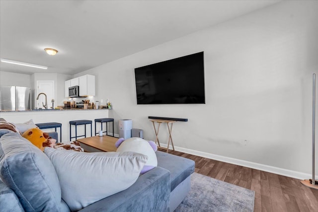 living room with wood-type flooring