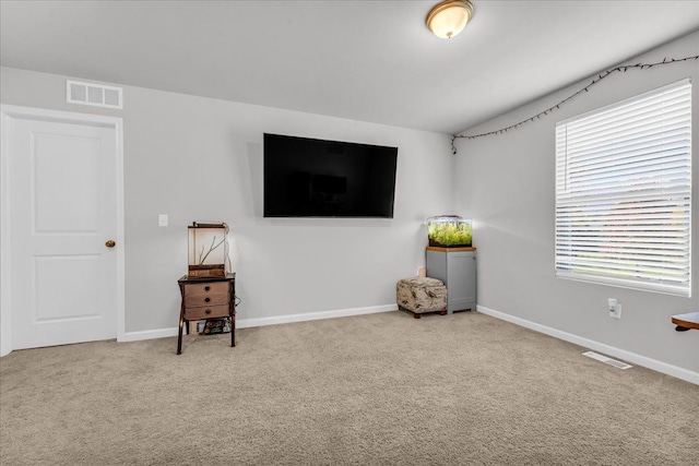 living area with carpet floors