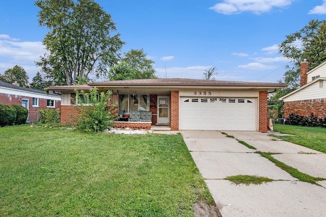 ranch-style house with a front lawn and a garage