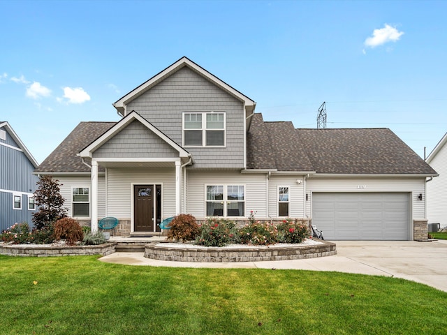 view of front facade with a garage and a front yard